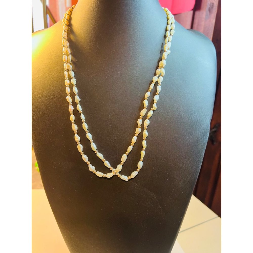 Pre owned vintage necklace with seed pearl beads.